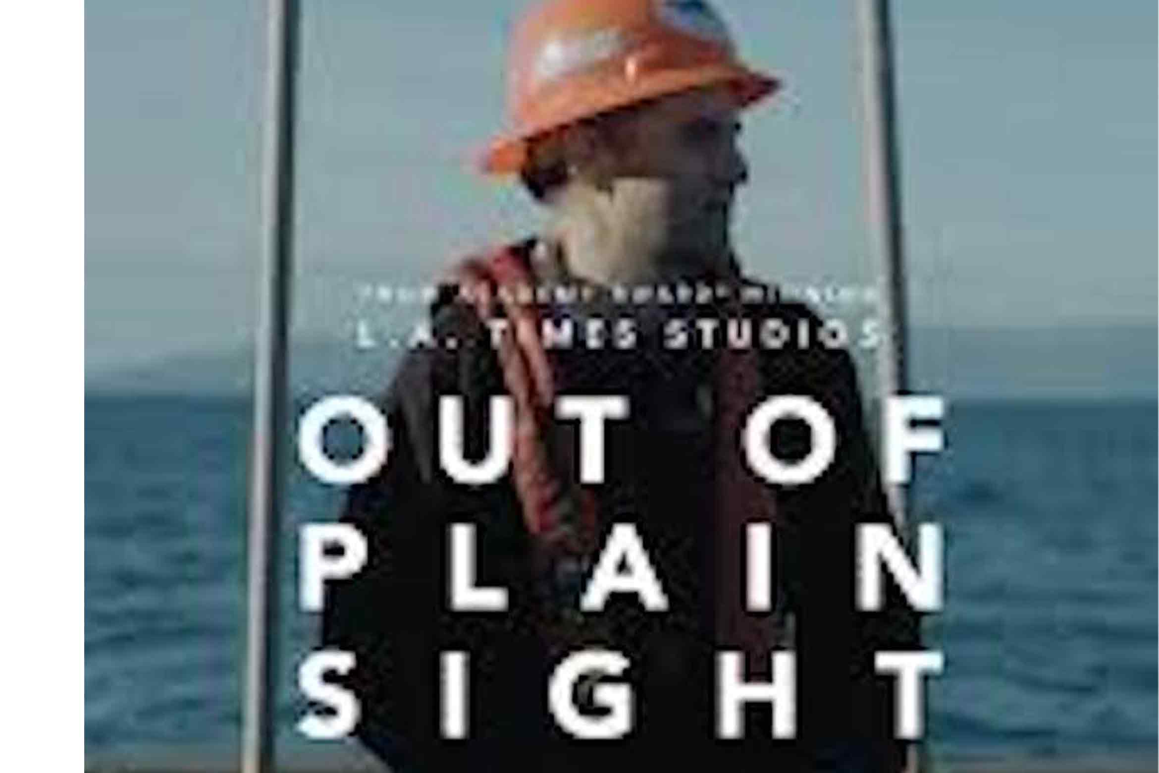 Out of Sight Movie poster featuring a man wearing a hard hat out at sea.